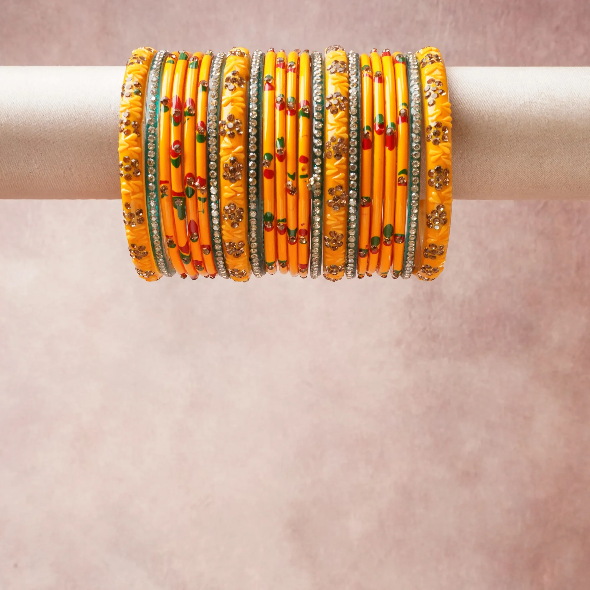 A commanding Marigold Yellow anchors this beautiful set, enriched with accents of Crimson Red, Emerald Green, Clear White, Gold, Teal that add depth and dimension.

Featuring a striking composition of Lacquer, Rhinestones, Base Metal, Enamel, this set carries intricate craftsmanship and strong presence. Grand in form, it is created for moments that deserve to be marked.